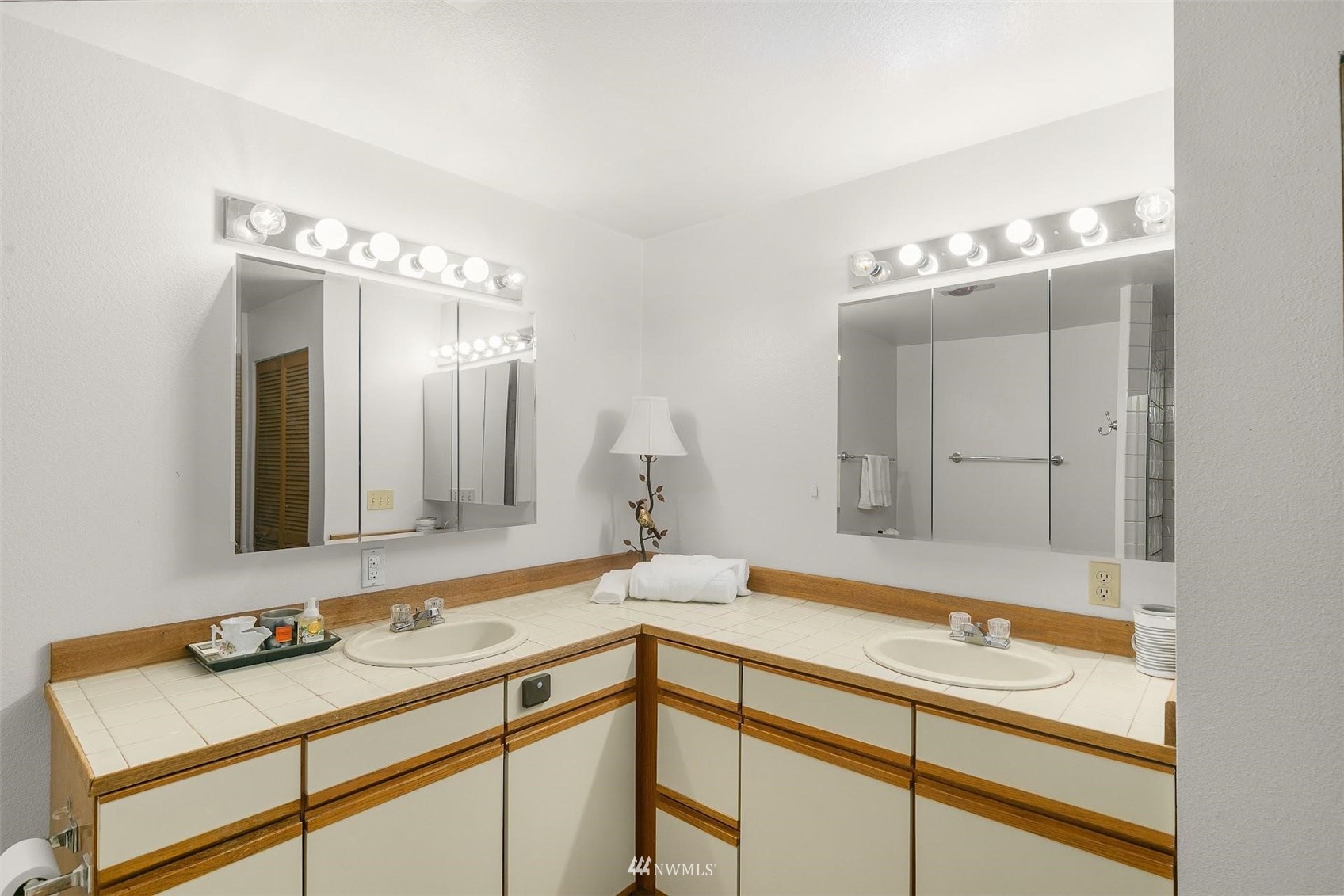 20712 29th Avenue Southeast Bothell, WA 98021 - Photo 13 of 40 a bathroom with a sink and a mirror