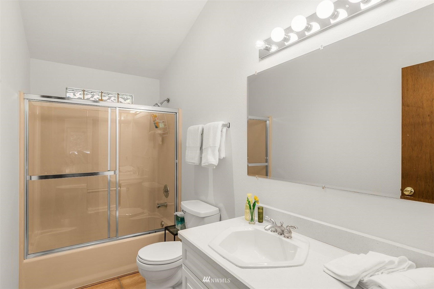 20712 29th Avenue Southeast Bothell, WA 98021 - Photo 17 of 40 a bathroom with a sink a toilet and shower