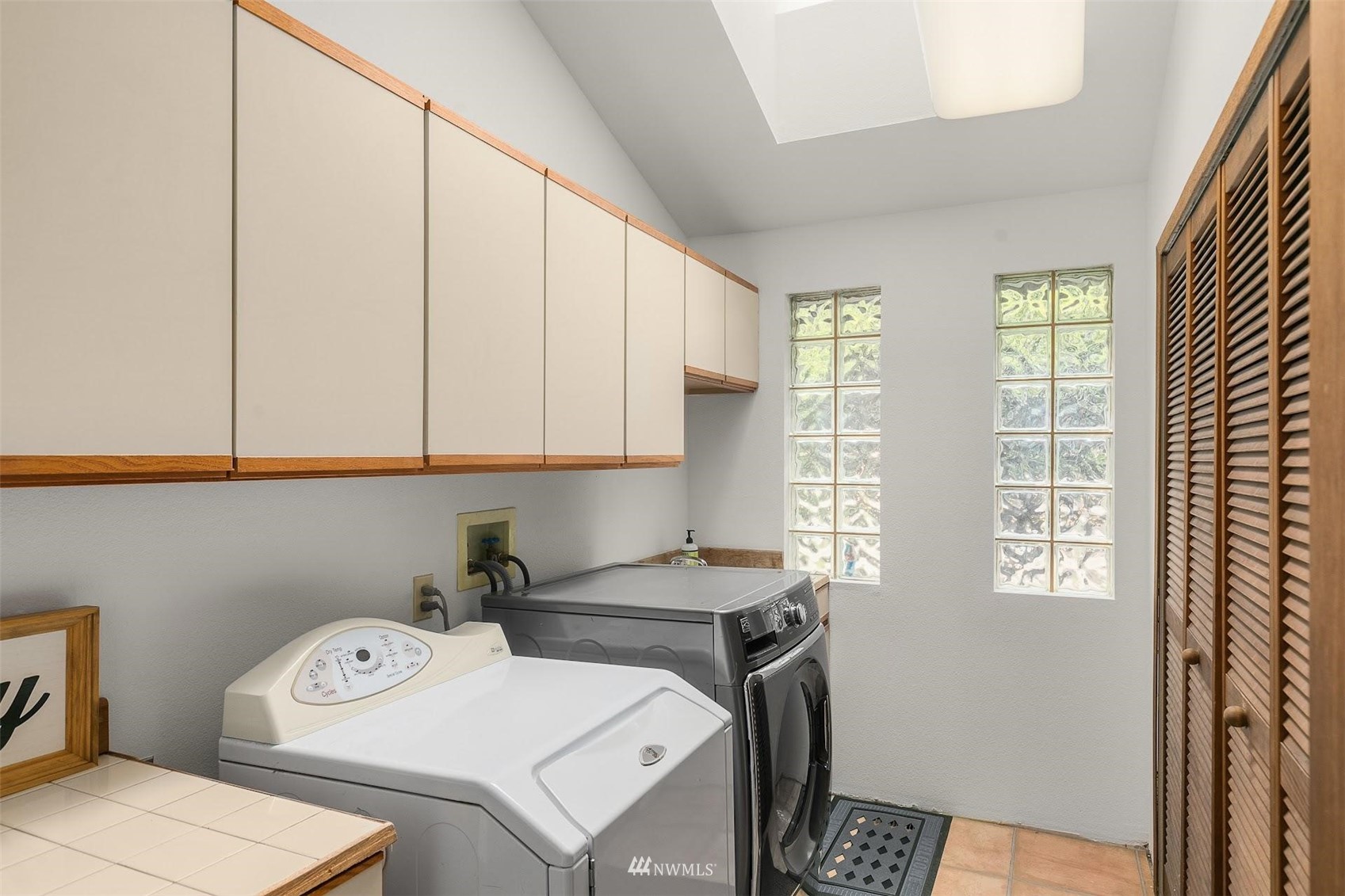 20712 29th Avenue Southeast Bothell, WA 98021 - Photo 18 of 40 a utility room with dryer and washer