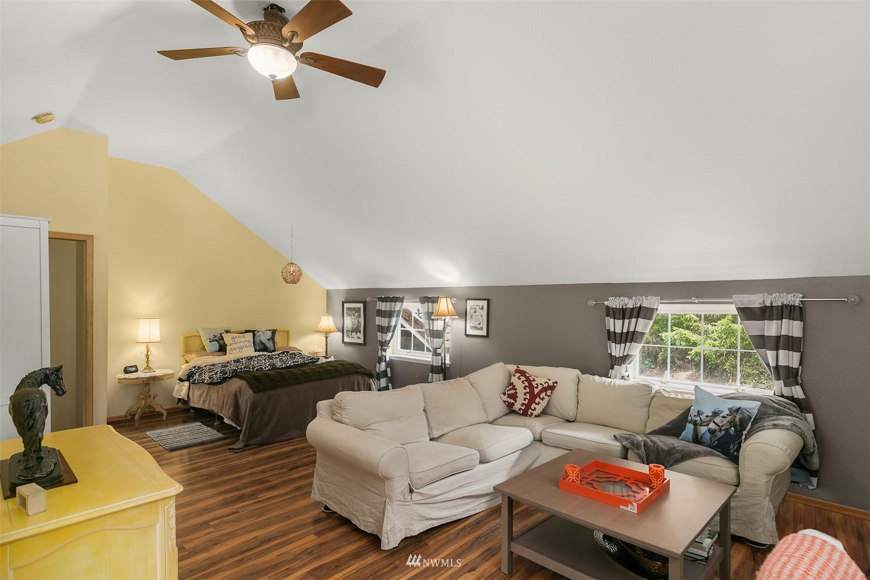 20712 29th Avenue Southeast Bothell, WA 98021 - Photo 20 of 40 a living room with furniture and a window