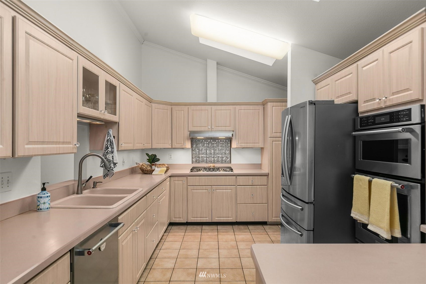 20712 29th Avenue Southeast Bothell, WA 98021 - Photo 10 of 40 a kitchen with a sink appliances and cabinets