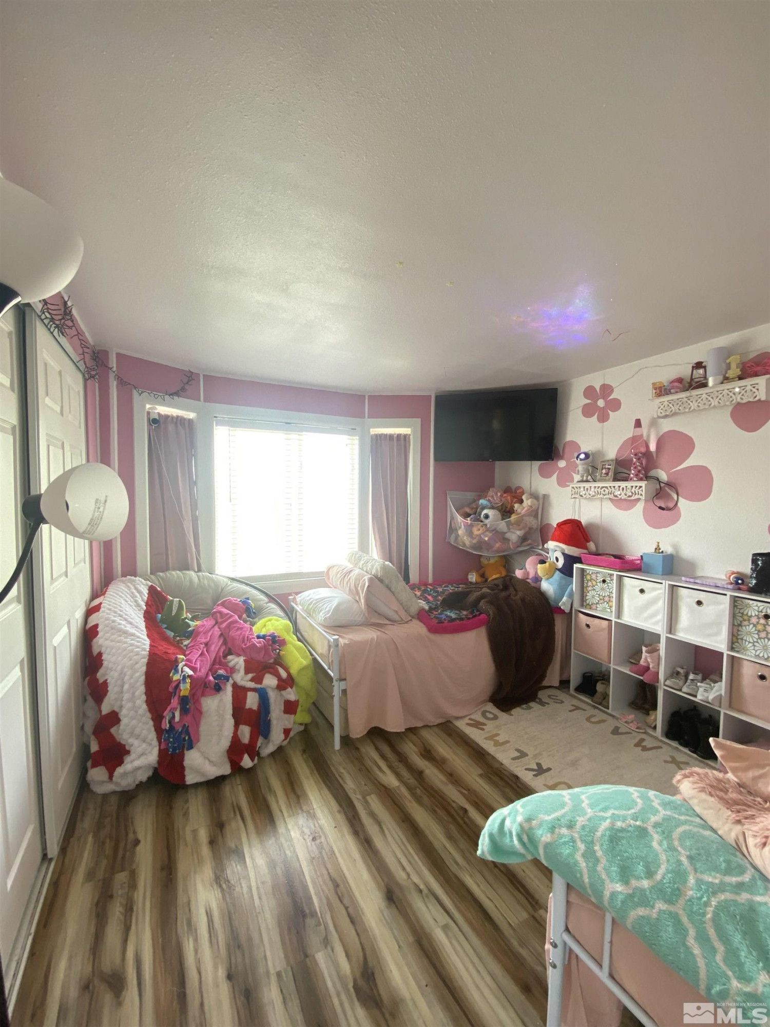 695 Good Choice Road Winnemucca, NV 89445 - Photo 11 of 29 a bedroom with bed and window