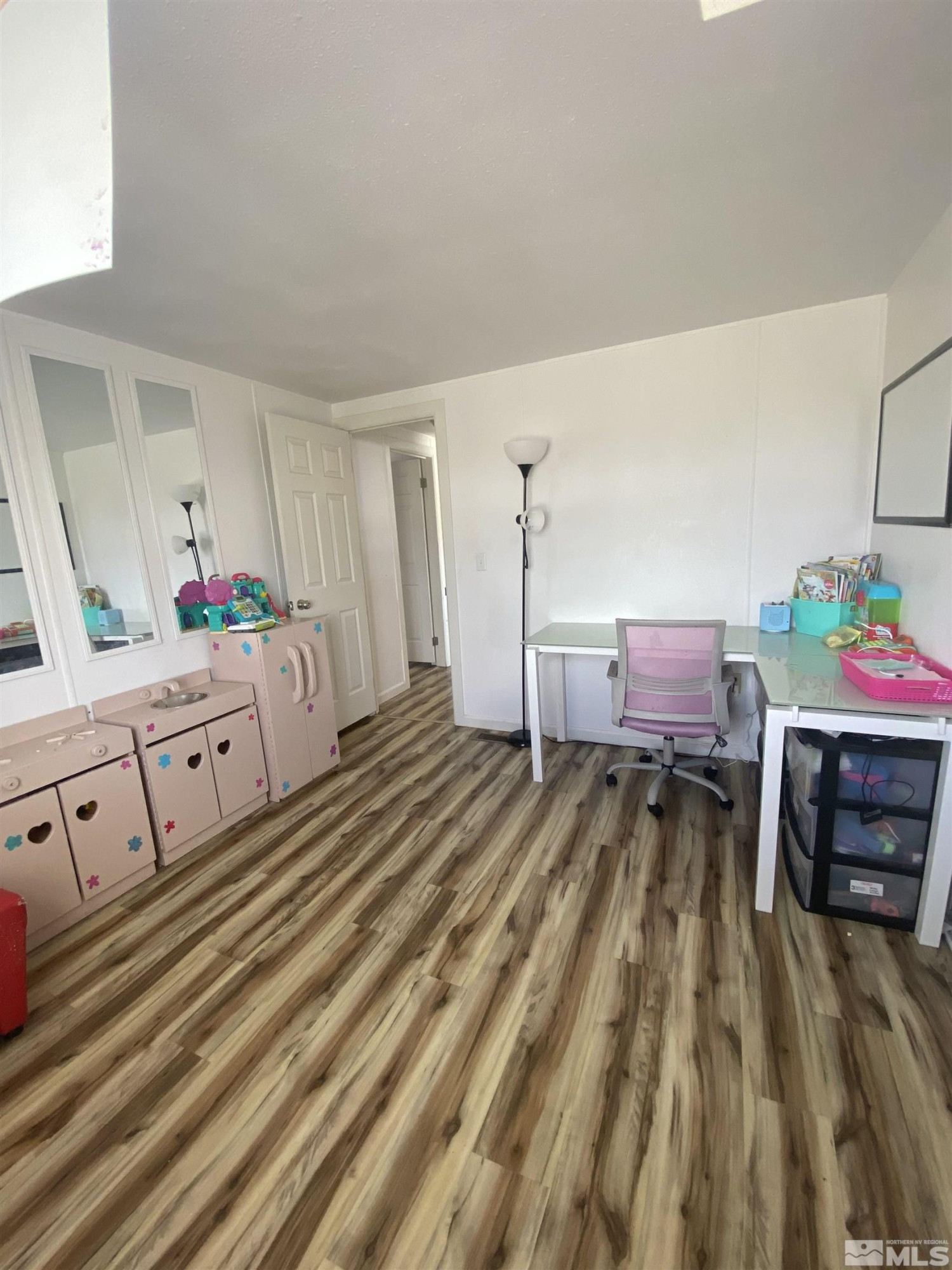 695 Good Choice Road Winnemucca, NV 89445 - Photo 13 of 29 a bed room with a bed and a cabinets