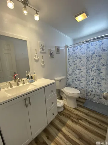 a kitchen with a sink and a stove top oven