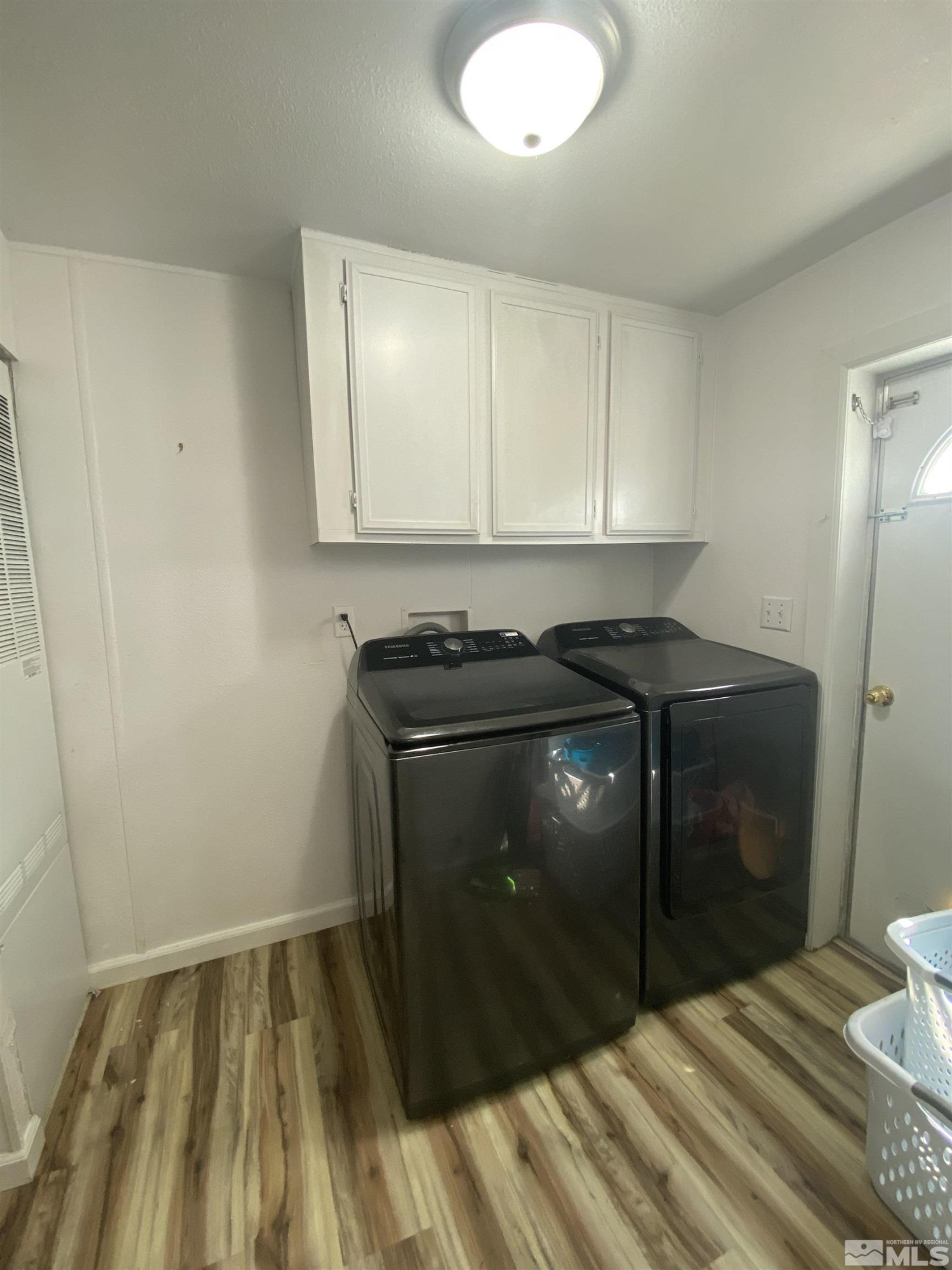 695 Good Choice Road Winnemucca, NV 89445 - Photo 15 of 29 a kitchen with a sink and a stove top oven