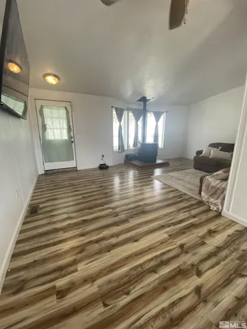 a view of an empty room and window