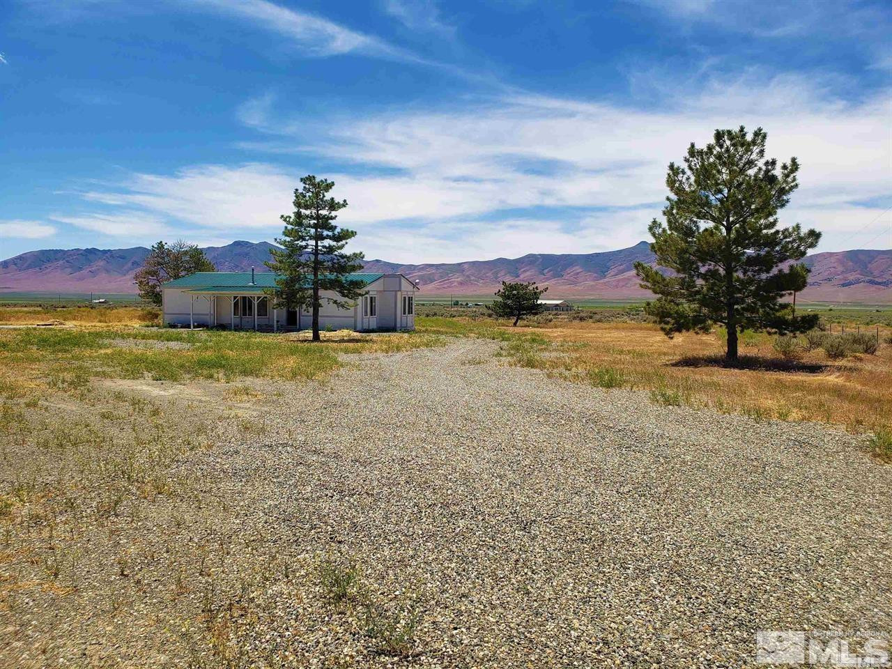 695 Good Choice Road Winnemucca, NV 89445 - Photo 24 of 29 a view of a houses with a yard