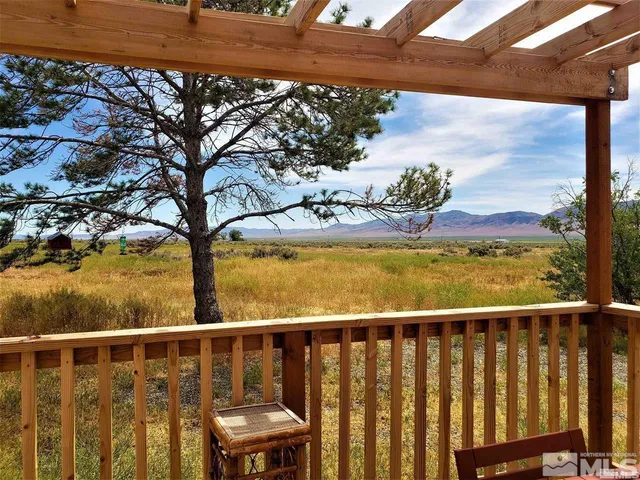 a view of a large house with a yard