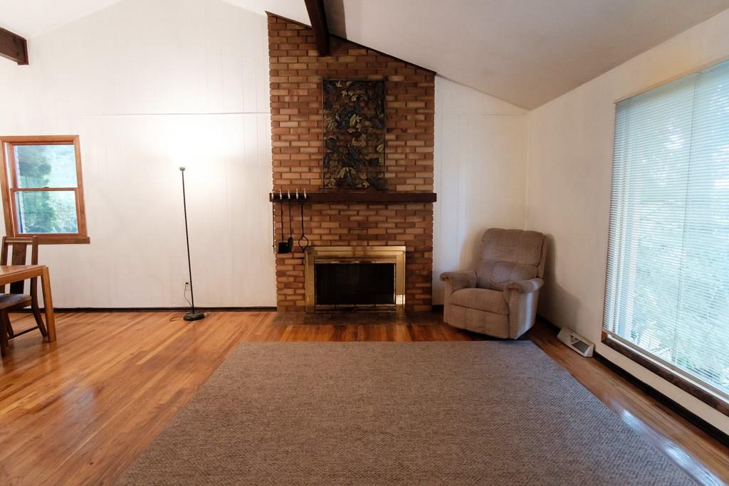 545 Center Church Road Canonsburg, PA 15317 - Photo 3 of 25 The living room has cathedral ceilings and a large window overlooking the wonderful front yard