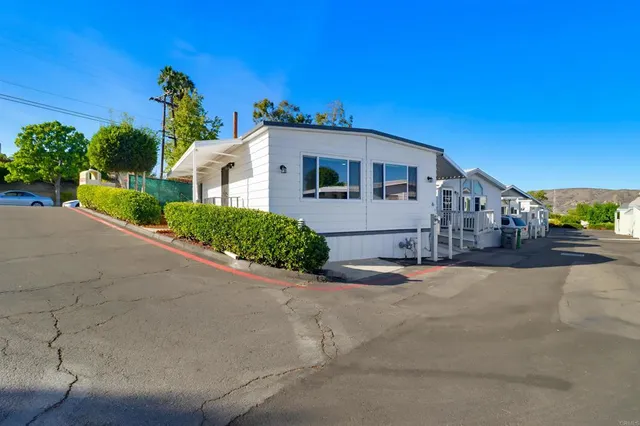 front view of a house with a street