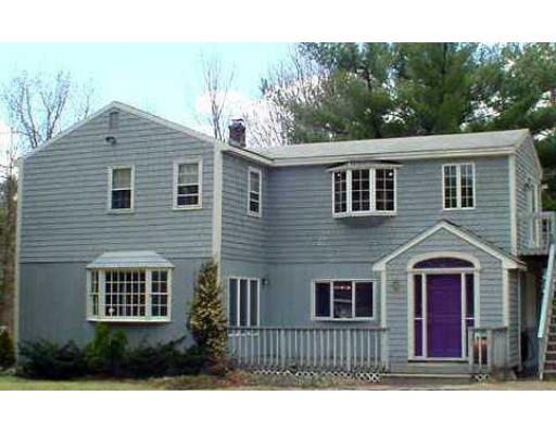 38 R County Road Andover, MA 01810 - Photo 1 of 4 a front view of a house with a yard