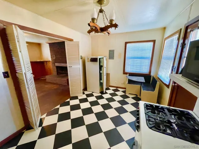 a black and white checkered floor with a black white checkered floor