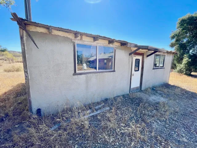 a backyard view of a house