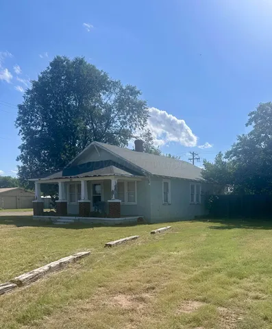 a view of a house with a swimming pool