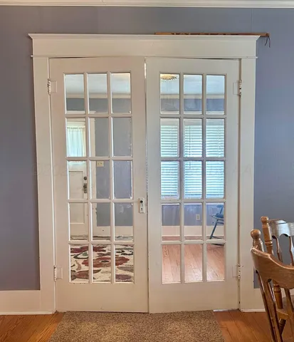 a view of livingroom with hardwood floor and a window