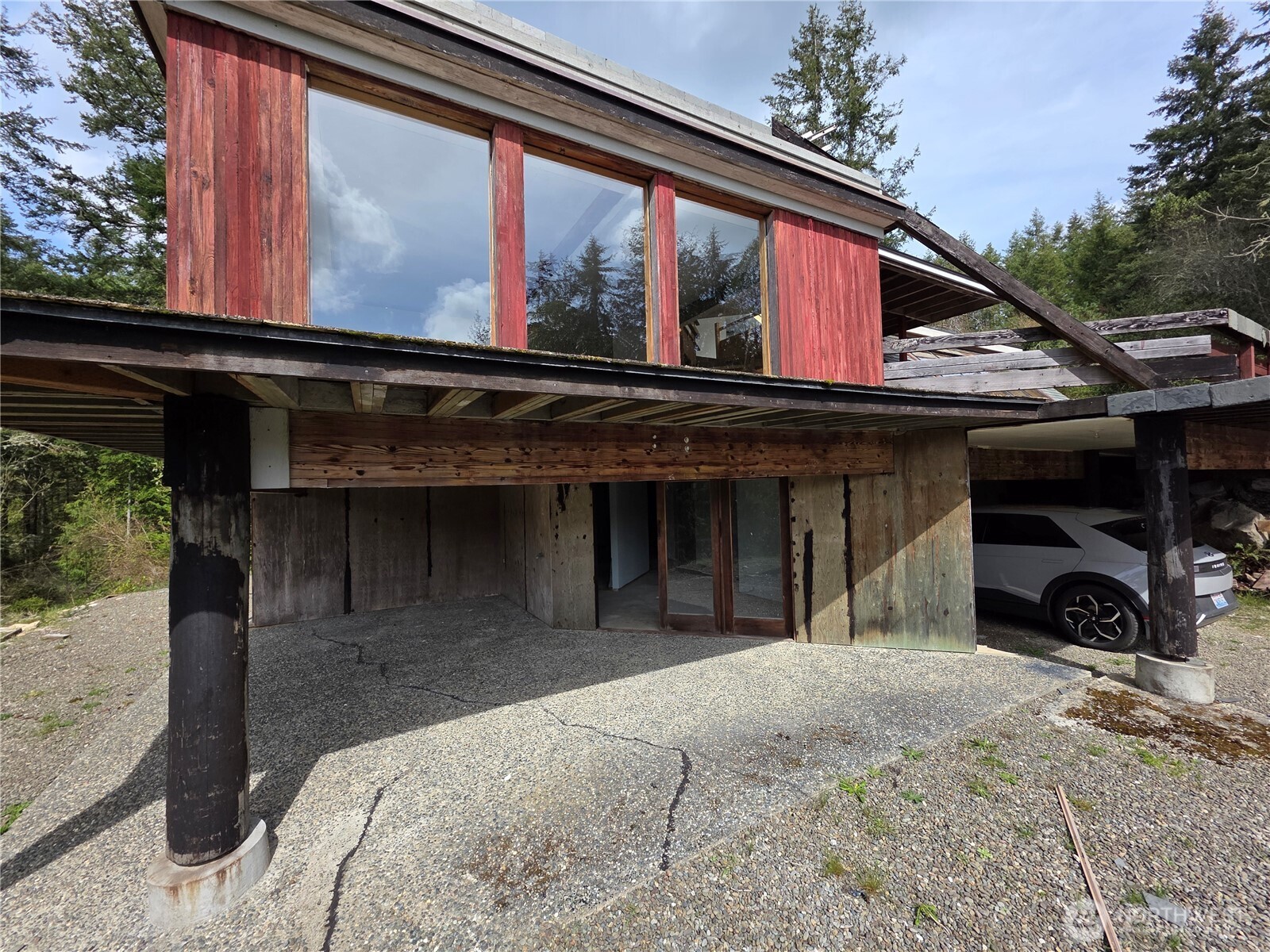 5612 Cape George Road Port Townsend, WA 98368 - Photo 13 of 17 a view of a house with a garage
