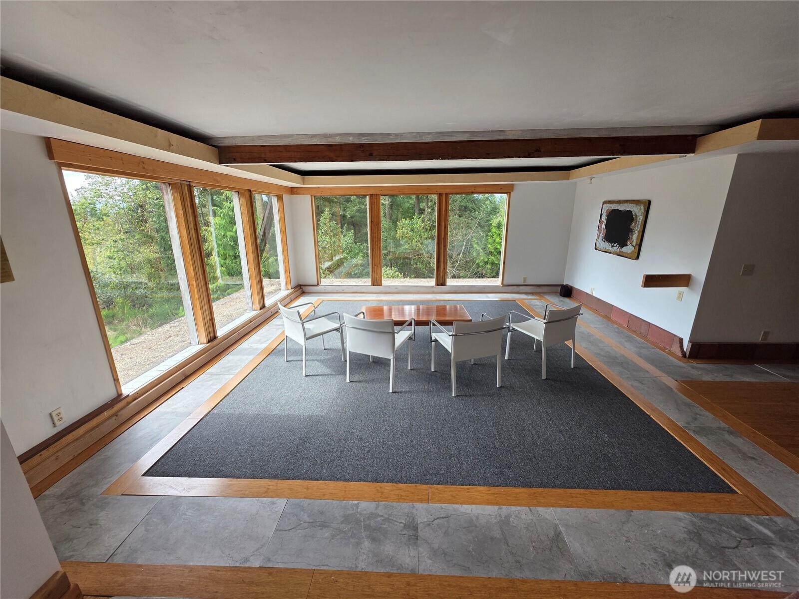 5612 Cape George Road Port Townsend, WA 98368 - Photo 4 of 17 a living room with a large window