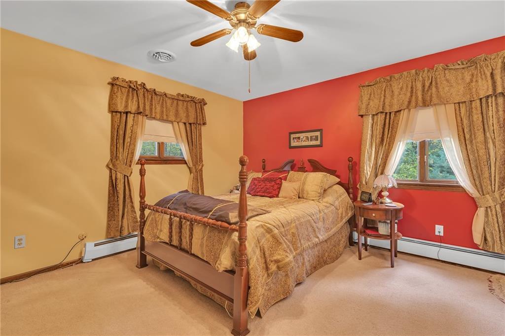 124 Heath Drive Baden, PA 15005 - Photo 15 of 38 a bedroom with a bed and a window