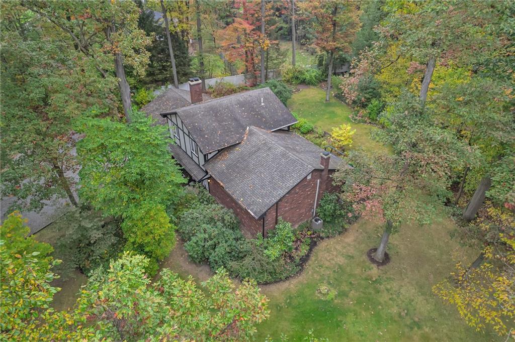 124 Heath Drive Baden, PA 15005 - Photo 2 of 38 a view of a garden with large trees