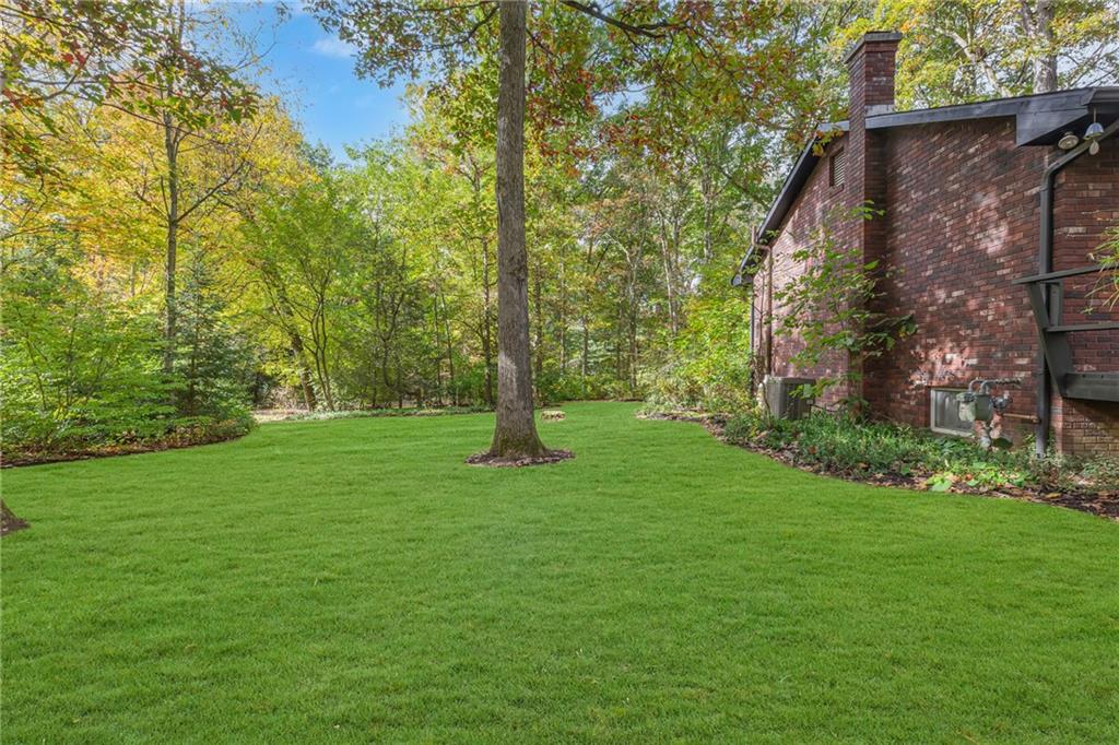 124 Heath Drive Baden, PA 15005 - Photo 25 of 38 a view of a trees in a yard