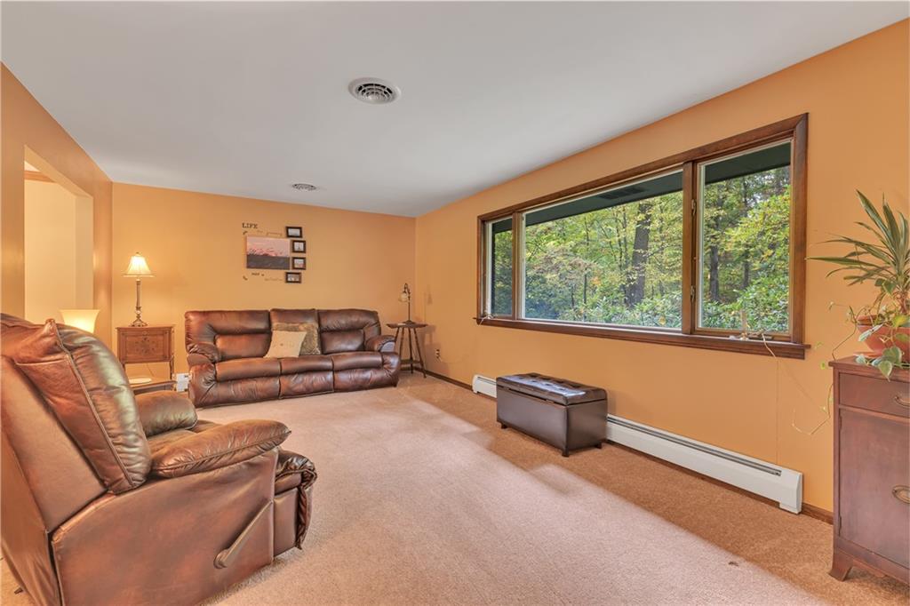 124 Heath Drive Baden, PA 15005 - Photo 5 of 38 a living room with furniture and a large window