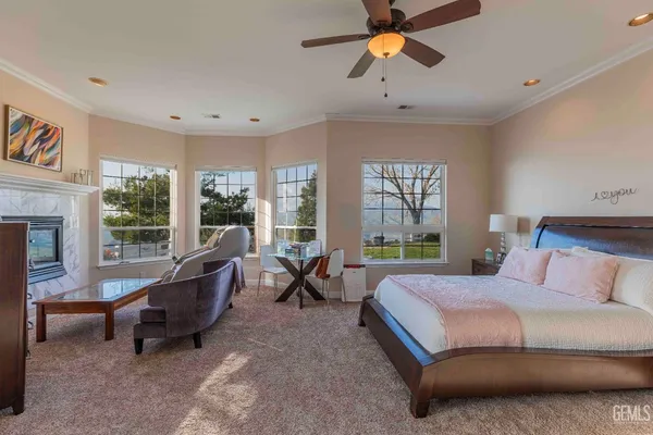 a bedroom with a bed and a couch