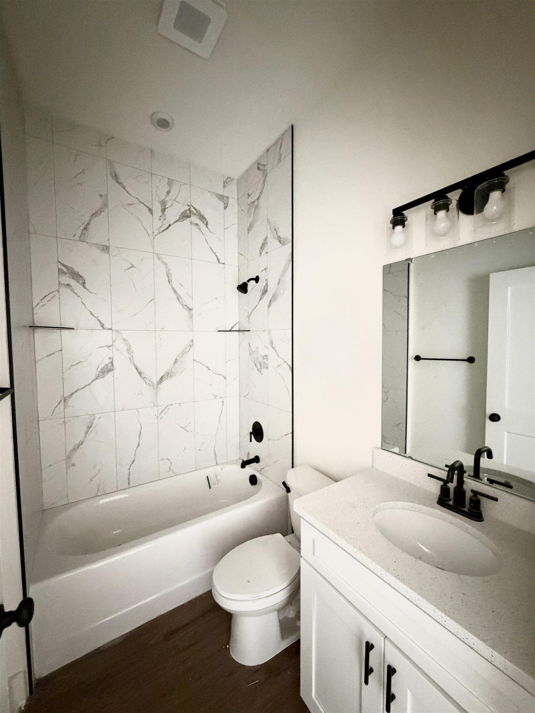 252 Jackson Boulevard St. Augustine, FL 32095 - Photo 4 of 5 a bathroom with a sink toilet and shower