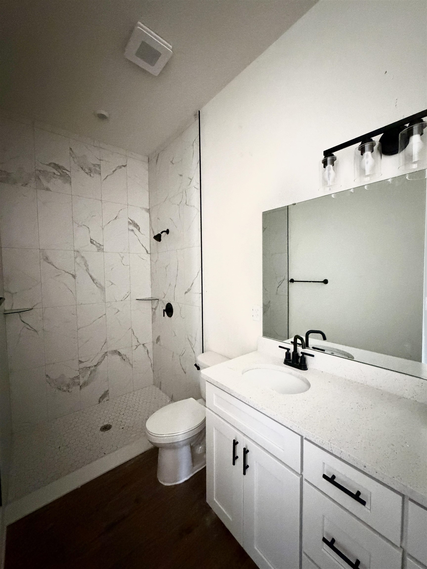 252 Jackson Boulevard St. Augustine, FL 32095 - Photo 5 of 5 a bathroom with a sink a toilet and shower