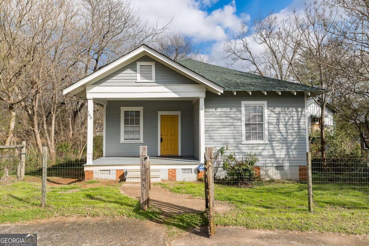 180 First Street Athens, GA 30601 - Photo 1 of 1 a front view of a house with garden