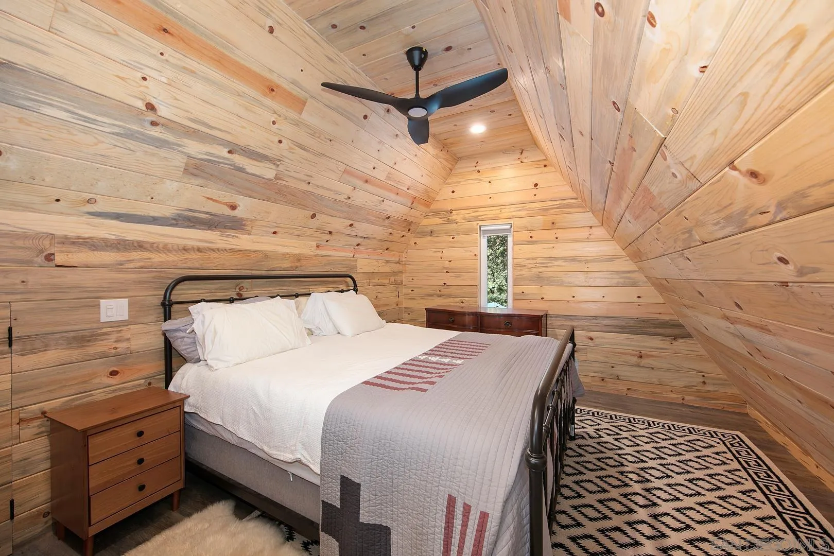 326 Laguna Tract Road Pine Valley, CA 91962 - Photo 14 of 29 a bedroom with a bed and wooden floor