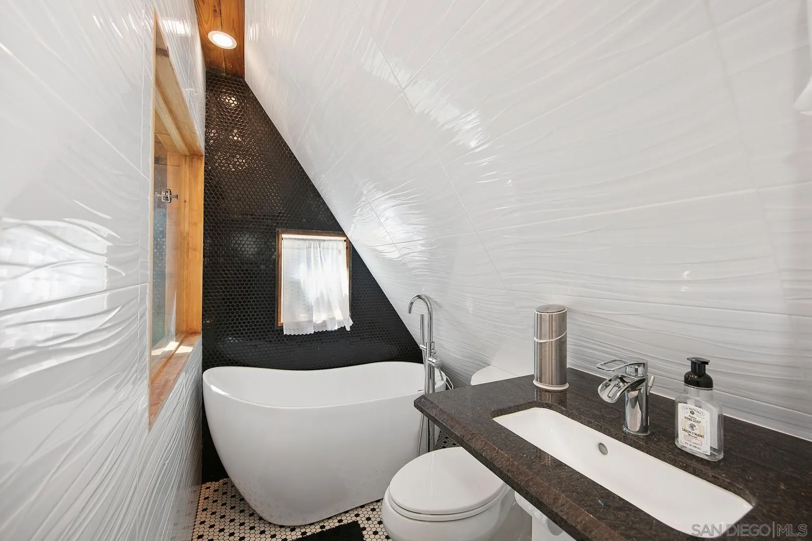 326 Laguna Tract Road Pine Valley, CA 91962 - Photo 16 of 29 a bathroom with a toilet a sink and mirror