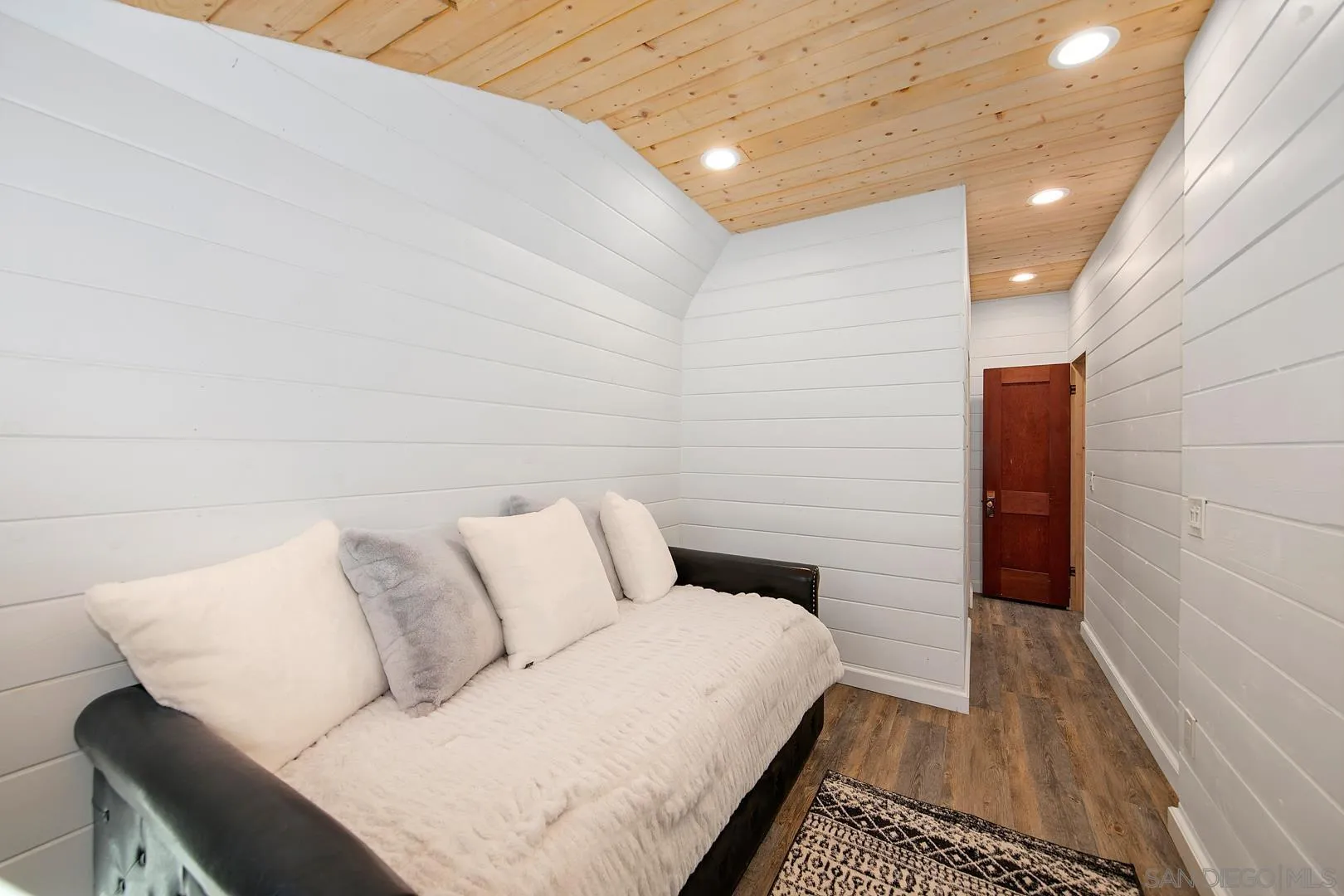 326 Laguna Tract Road Pine Valley, CA 91962 - Photo 21 of 29 a living room with a couch and a rug