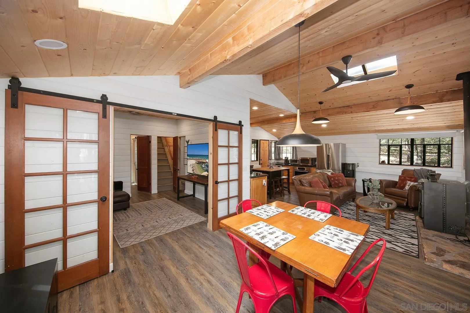 326 Laguna Tract Road Pine Valley, CA 91962 - Photo 9 of 29 a living room with furniture a rug and a table