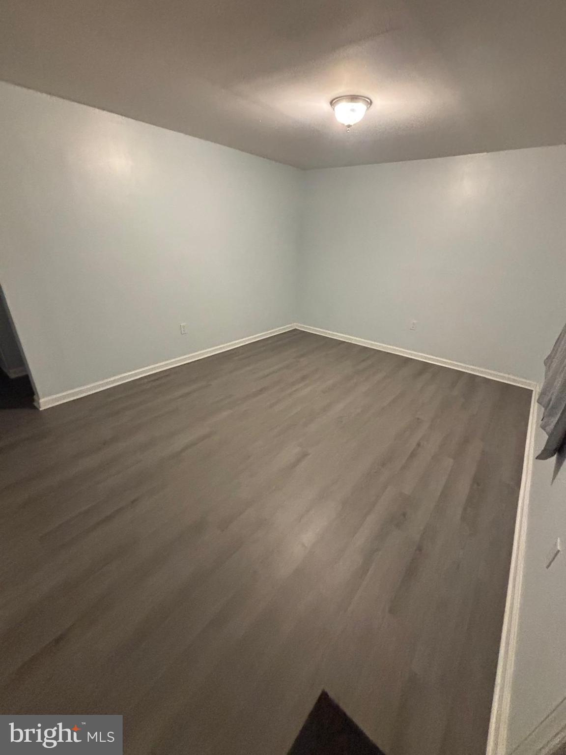 926 Anvil Road Fredericksburg, VA 22405 - Photo 2 of 11 an empty room with wooden floor & windows