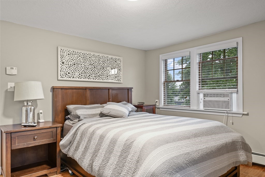 19 Coventry Road Worcester, MA 01606 - Photo 12 of 28 a bedroom with a bed and a window