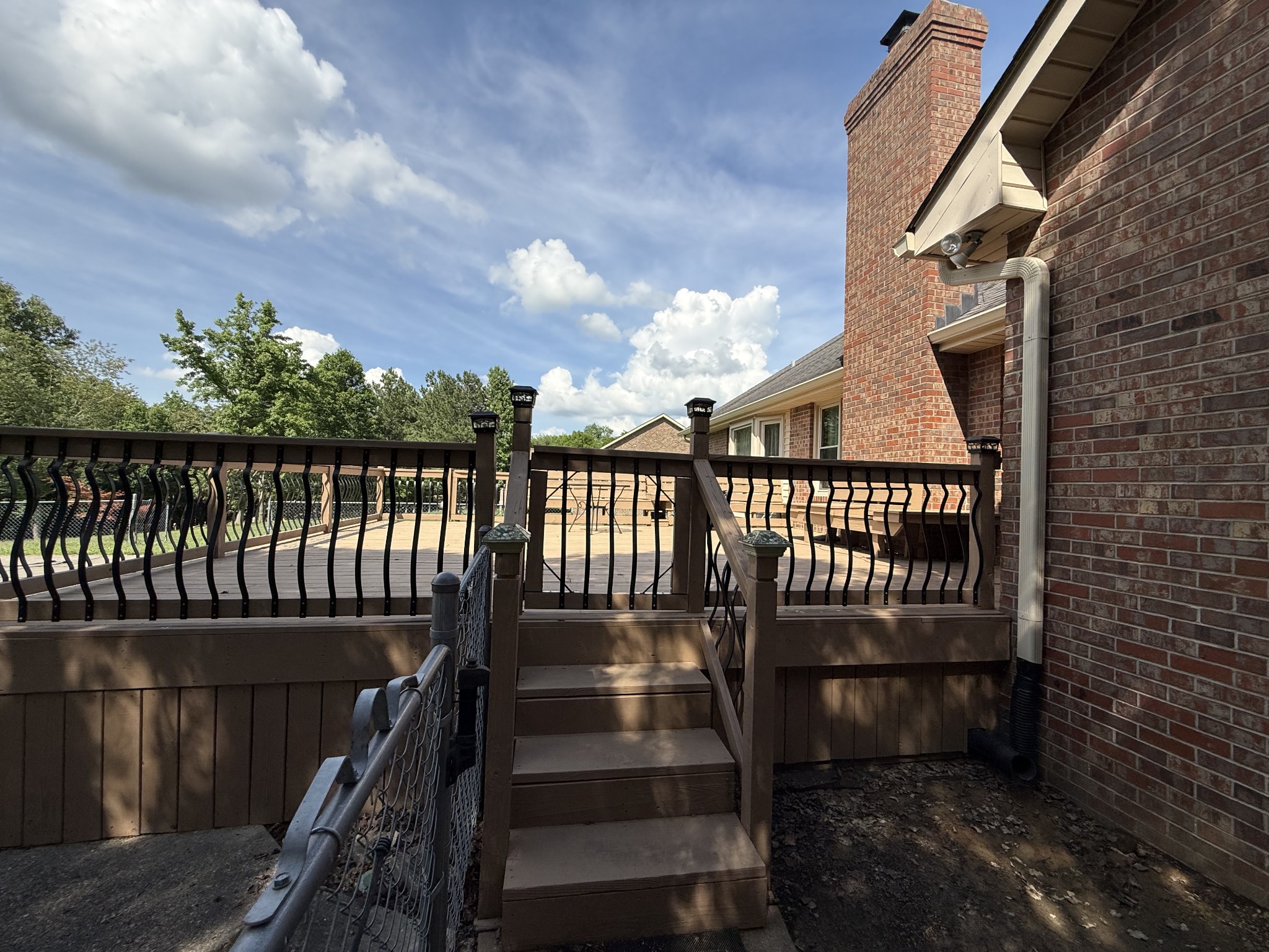 3168 Maxey Road Cedar Hill, TN 37032 - Photo 12 of 40 a view of a balcony with wooden floor and outdoor seating