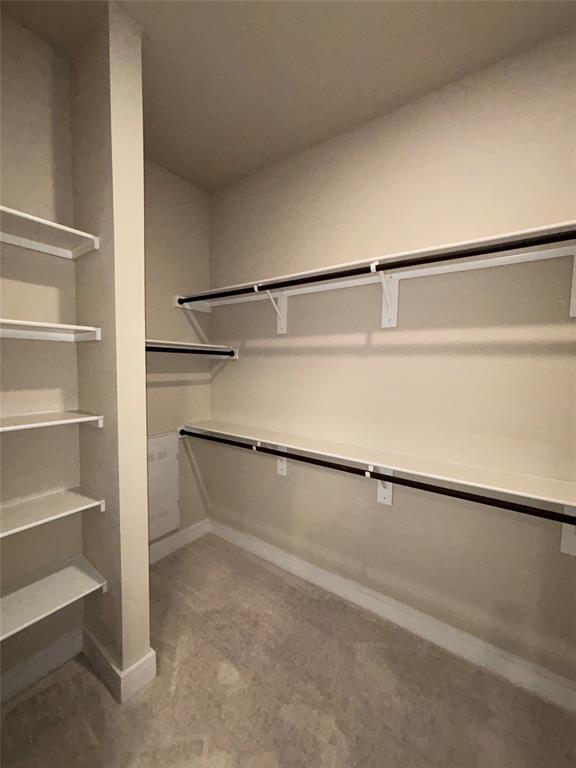 111 Town Place, Unit 2290 Fairview, TX 75069 - Photo 12 of 30 a view of an empty walk in closet
