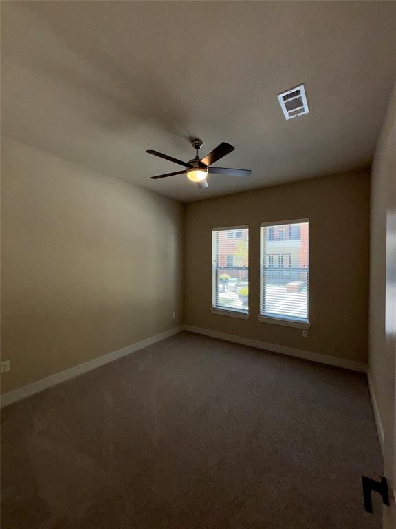 111 Town Place, Unit 2290 Fairview, TX 75069 - Photo 9 of 30 a view of a livingroom with a ceiling fan and window