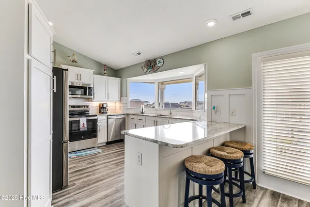 $1,199,000 | 185 Yacht Watch Drive, Holden Beach, NC 28462