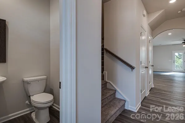 a bathroom with a toilet and a sink