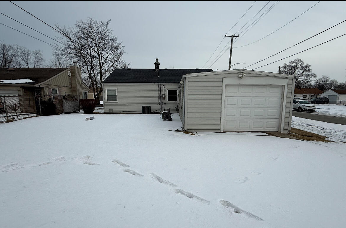 400 North Virginia Street Hobart, IN 46342 - Photo 12 of 13 a view of a house with a garage