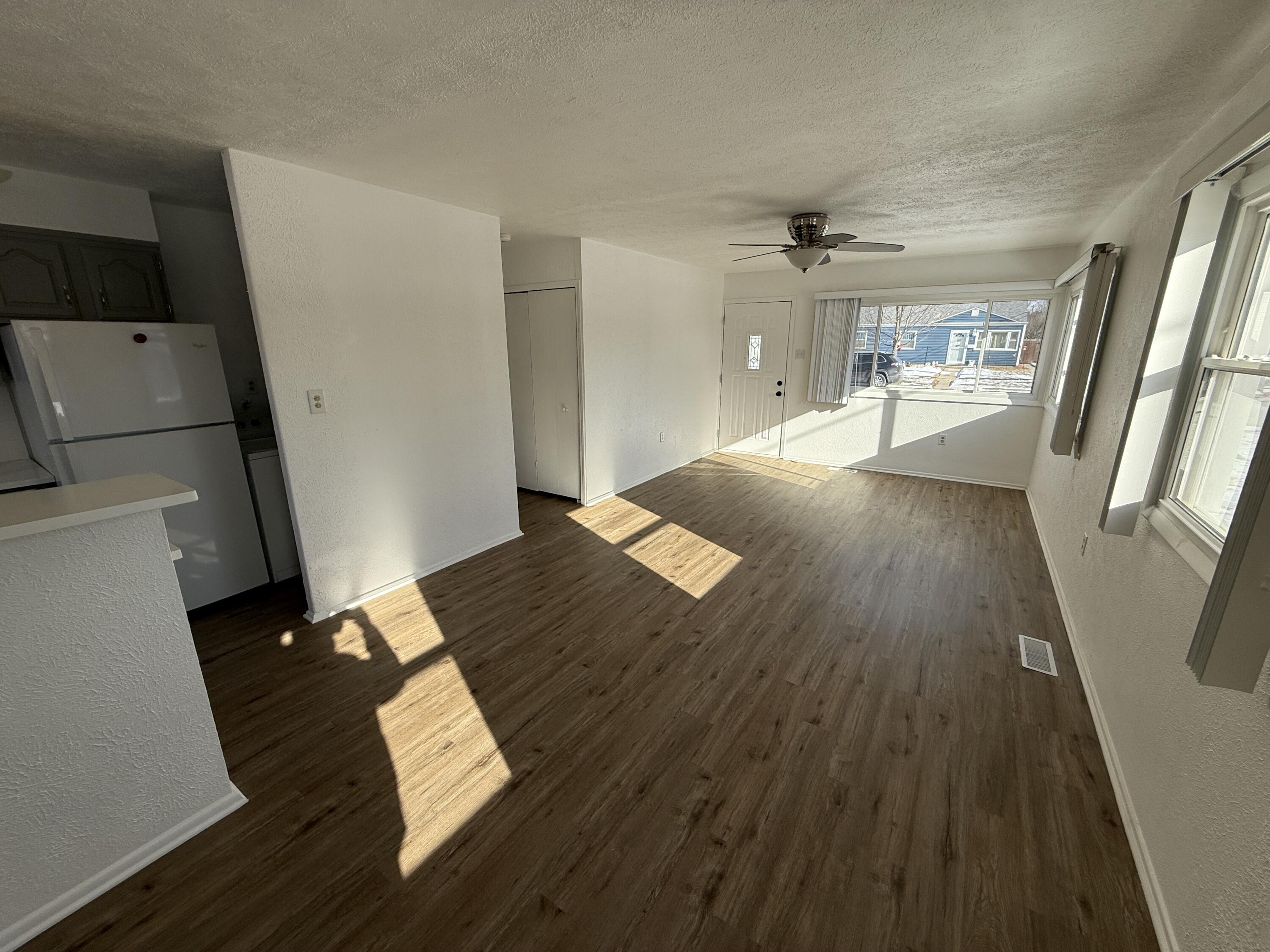 400 North Virginia Street Hobart, IN 46342 - Photo 5 of 13 a view of a living room and wooden floor
