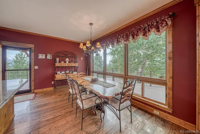 a view of balcony with wooden floor