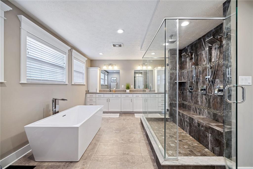 212 Stoneridge Lane Mars, PA 16046 - Photo 29 of 50 a bathroom with a tub shower and sink