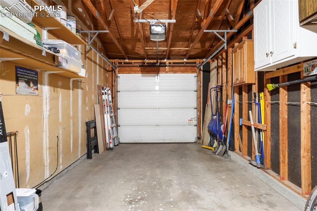 2417 Ranch Lane Colorado Springs, CO 80918 - Photo 20 of 32 a view of a storage room with stairs