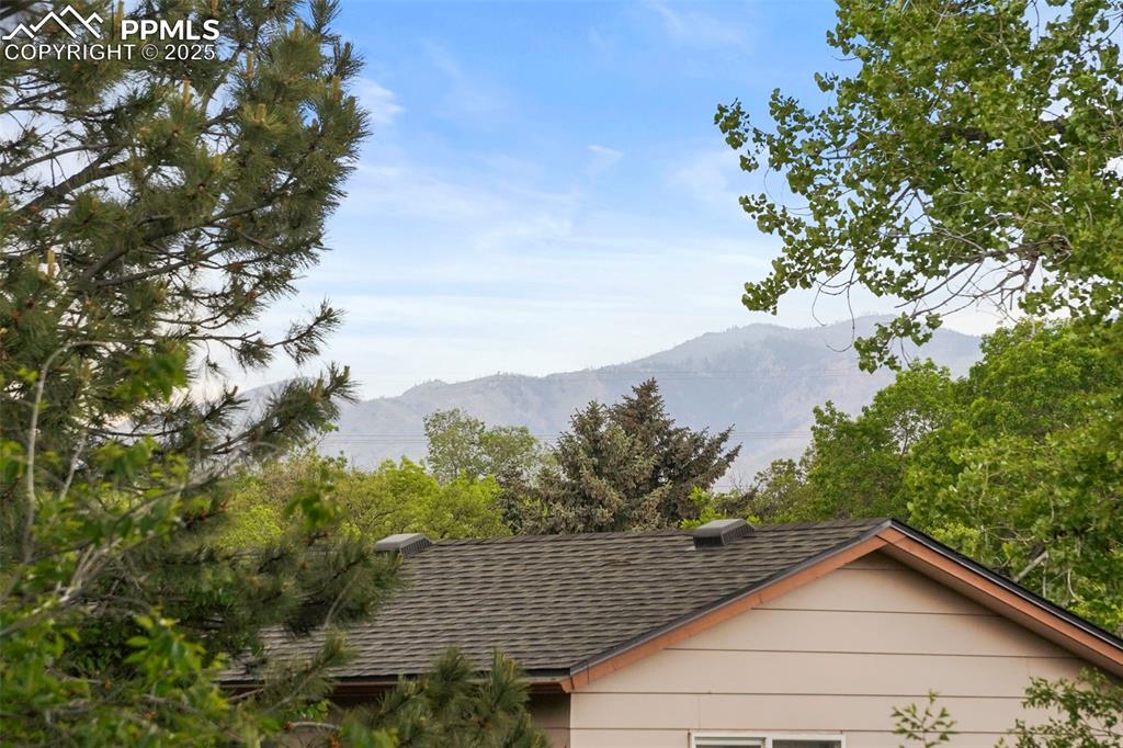 2417 Ranch Lane Colorado Springs, CO 80918 - Photo 27 of 32 a view of a house with a yard