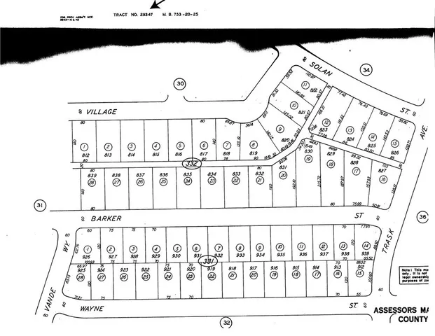 a view of a hallway with a book shelf