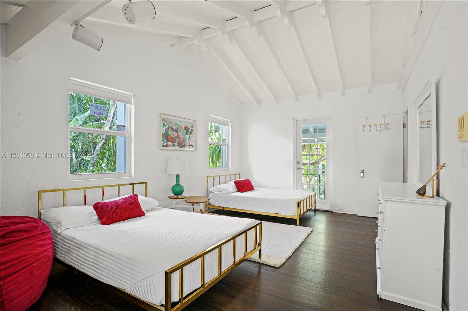 1701 Micanopy Avenue Miami, FL 33133 - Photo 26 of 46 a bedroom with bed and a large window