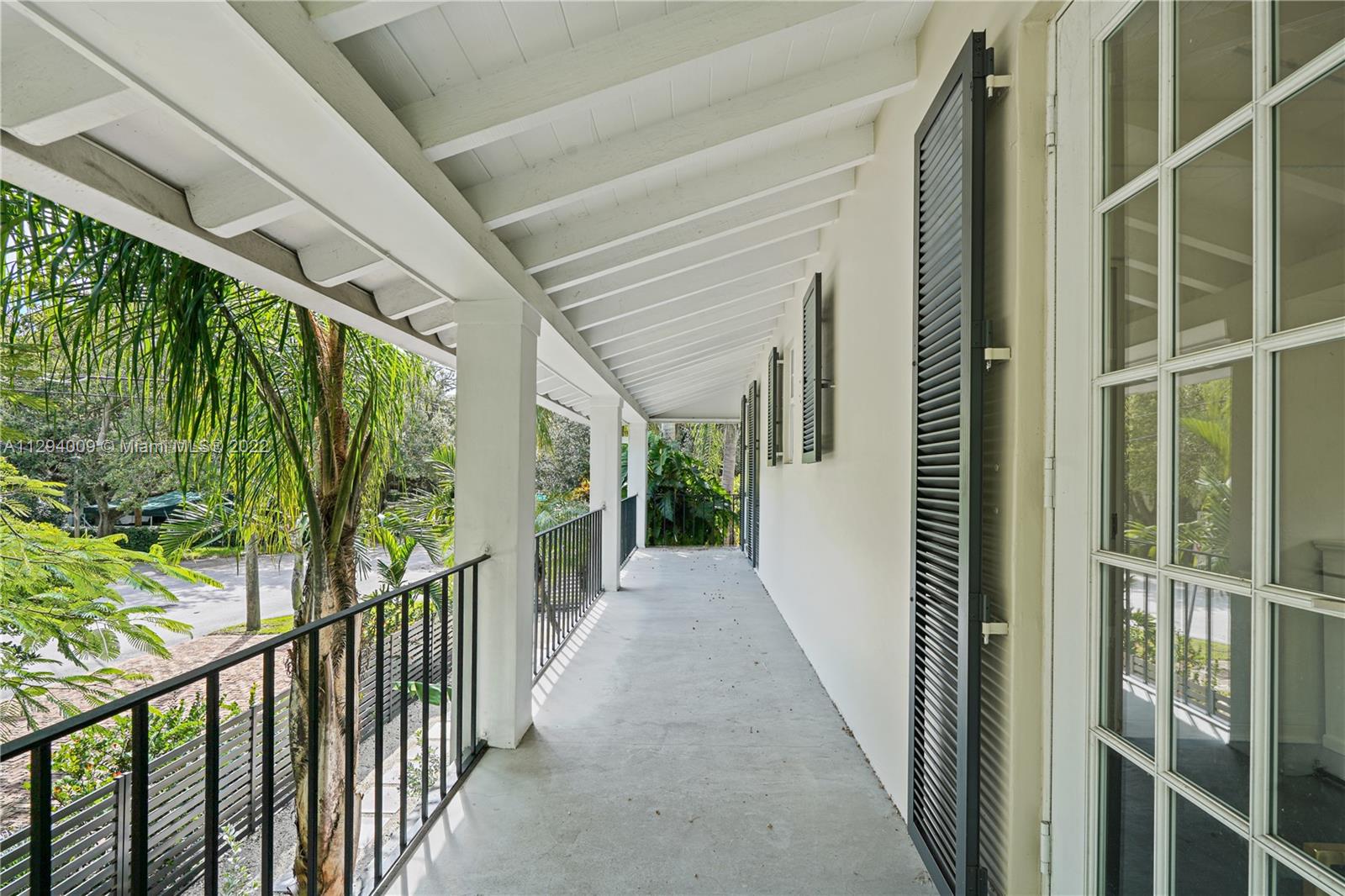 1701 Micanopy Avenue Miami, FL 33133 - Photo 29 of 46 a view of a porch
