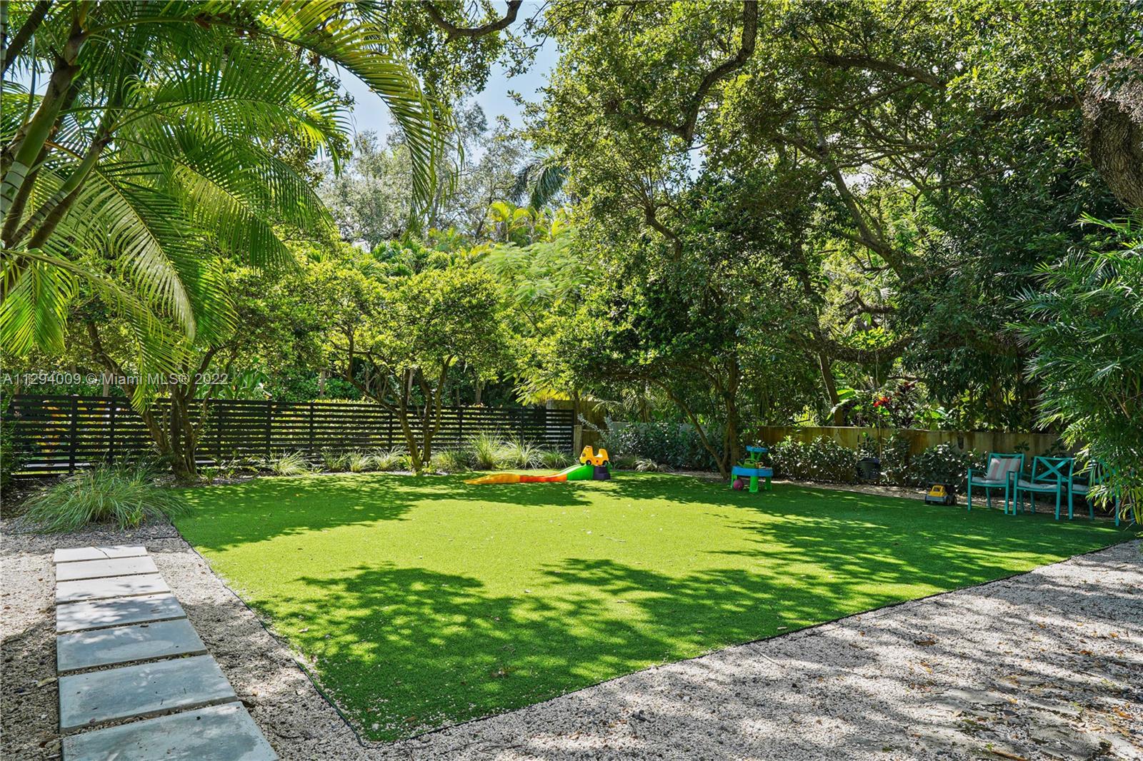 1701 Micanopy Avenue Miami, FL 33133 - Photo 38 of 46 a view of a park with plants and trees
